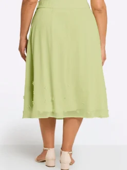 Chiffonrock mit Blüten-Applikationen am Saum