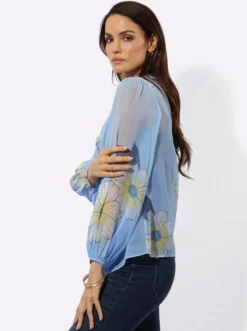 Druckbluse mit romantischen Rüschen