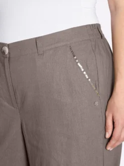 Leinenhose mit Pailletten an den Taschen