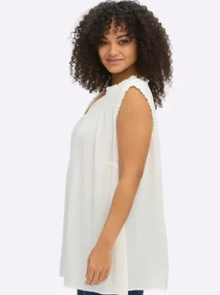 Ärmellose Bluse mit Rüschen und Stickerei